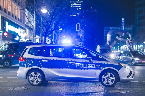 depositphotos_707023694-stock-photo-german-police-car-waiting-road